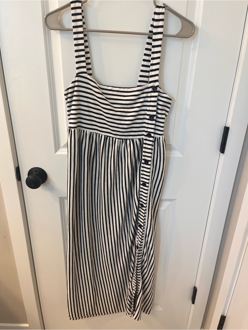 This is the Maeve "Fiona" Striped Midi Dress from Anthropologie